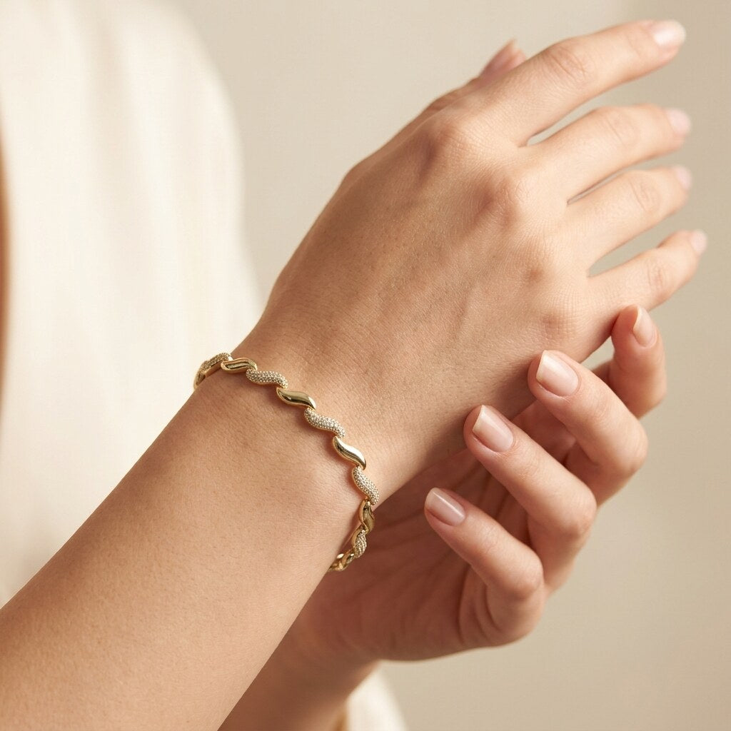 Gedrehtes Gliederarmband Gold mit Zirkonia